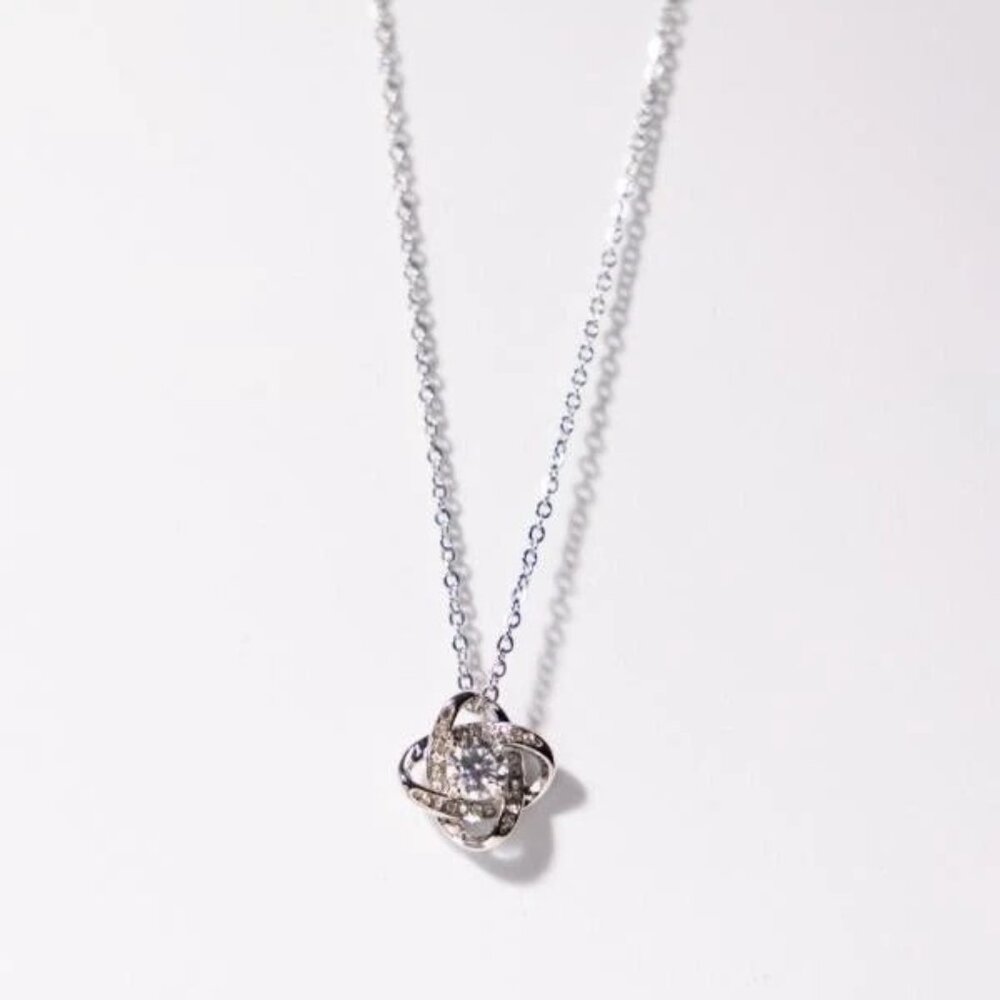 IRAMAT Crystal Flower Pendant Necklace - Elegant Sparkling Jewelry for Women